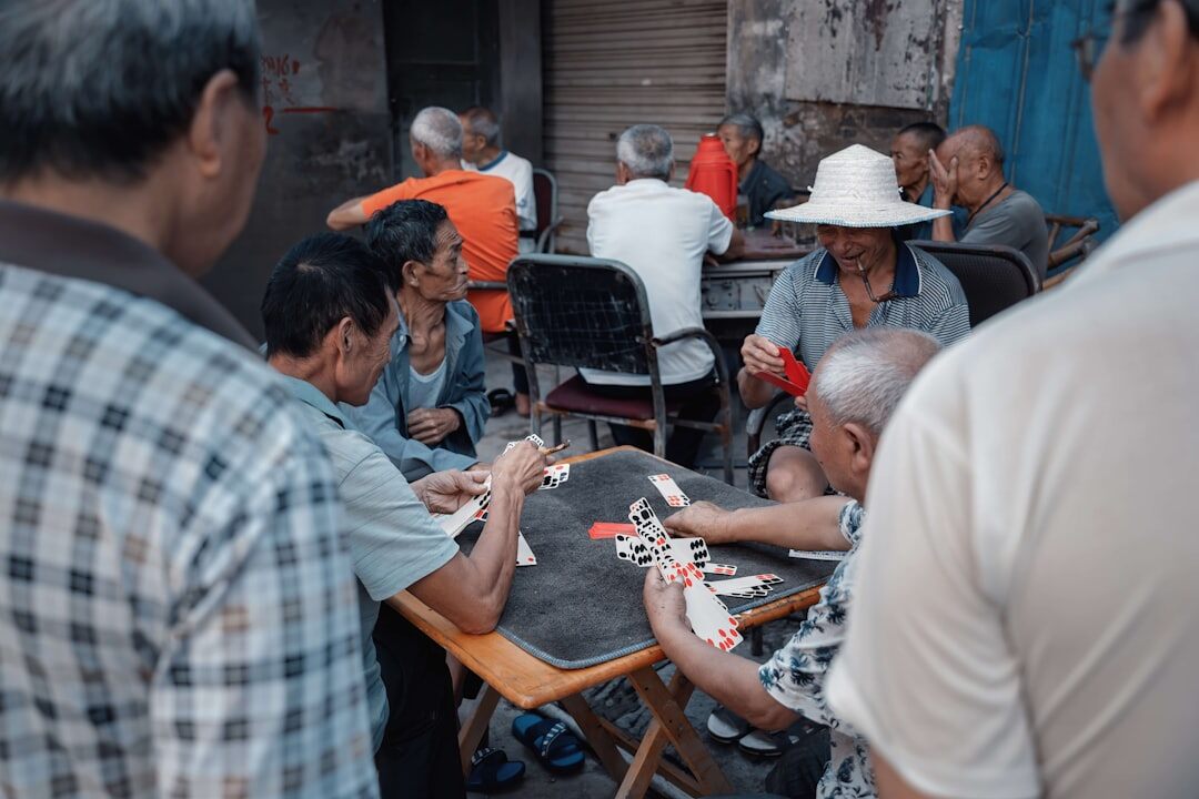 group of seniors playing cards