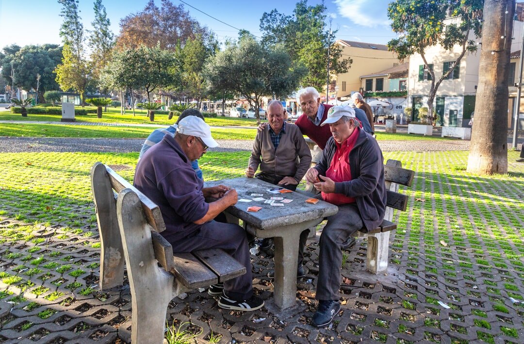 group of seniors playing cards